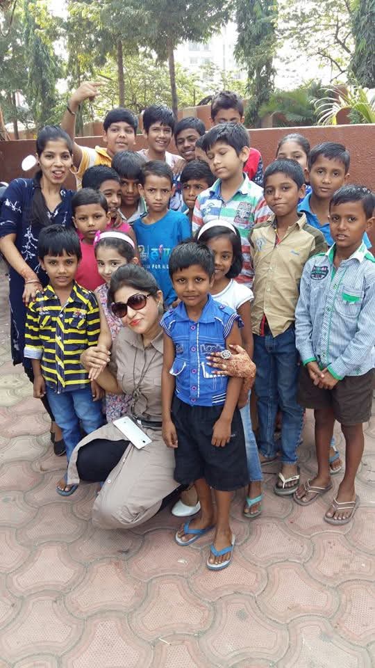 Children and volunteers gathered outdoors